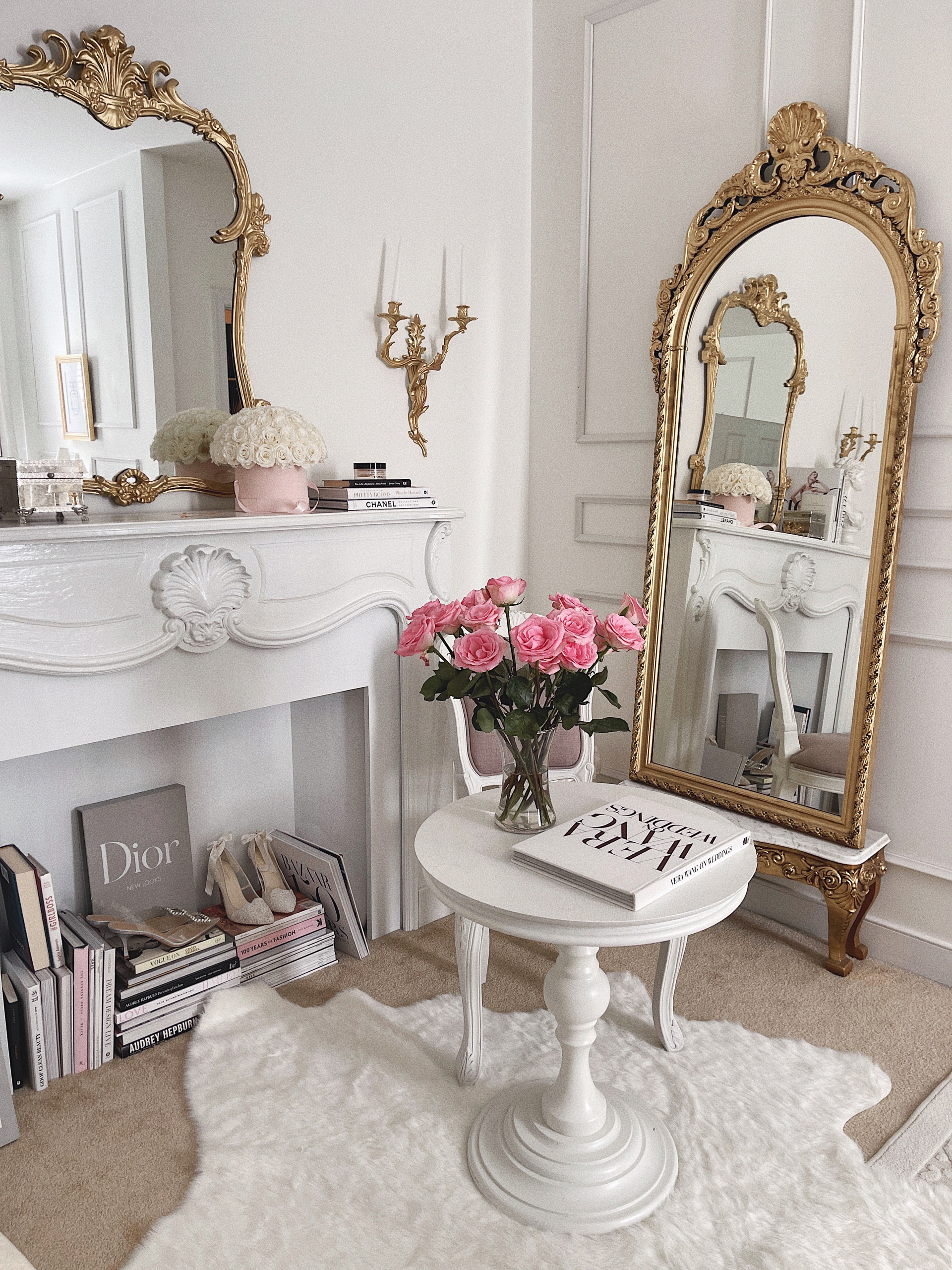 Chanel inspired coffee table decor. Plus a Jo Malone candle and white  flowers.